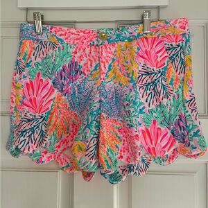 Lilly Pulitzer Vibrant Pink and Green High butter cup shorts.